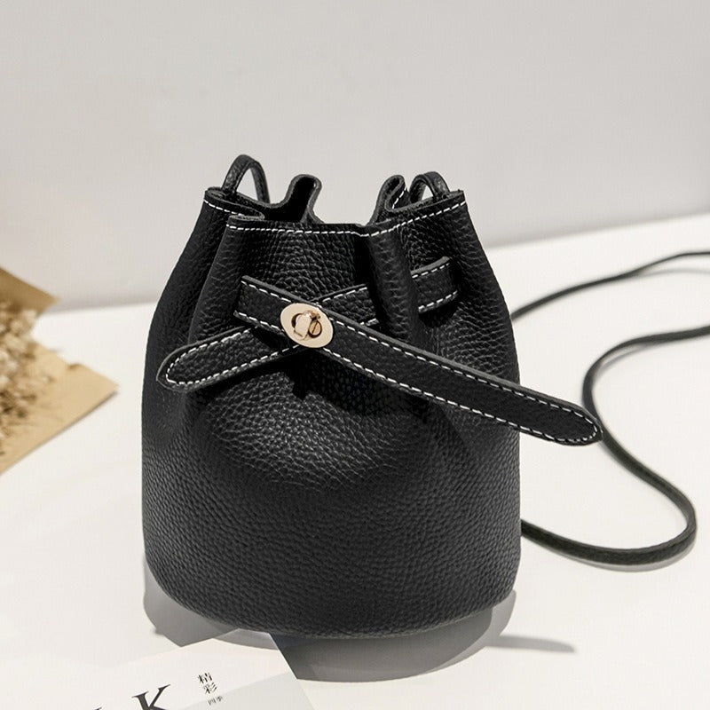 Guangzhou supply 2024 new simple bucket bag wide-band lock small bag Korean version casual solid color single shoulder